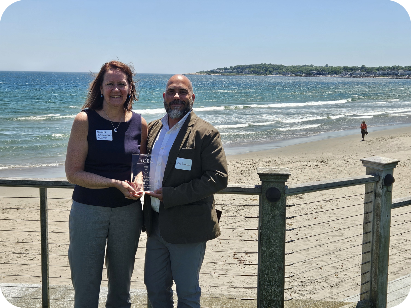 Nicole Iannuzzi and Joe Simmons accepting ACEC/RI Engineering Excellence Award
